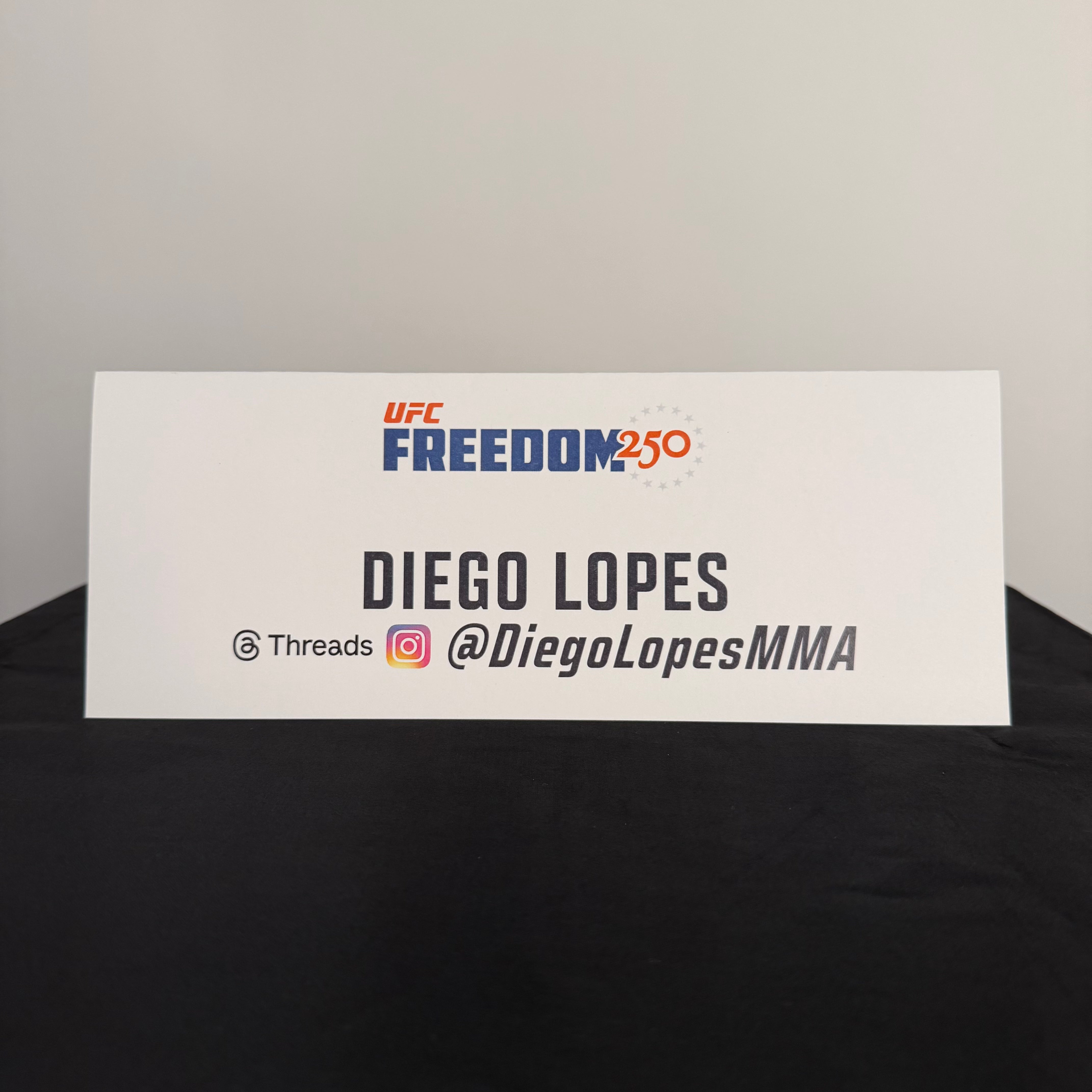 Diego Lopes Press Conference Name Card UFC Freedom 250: Topuria vs