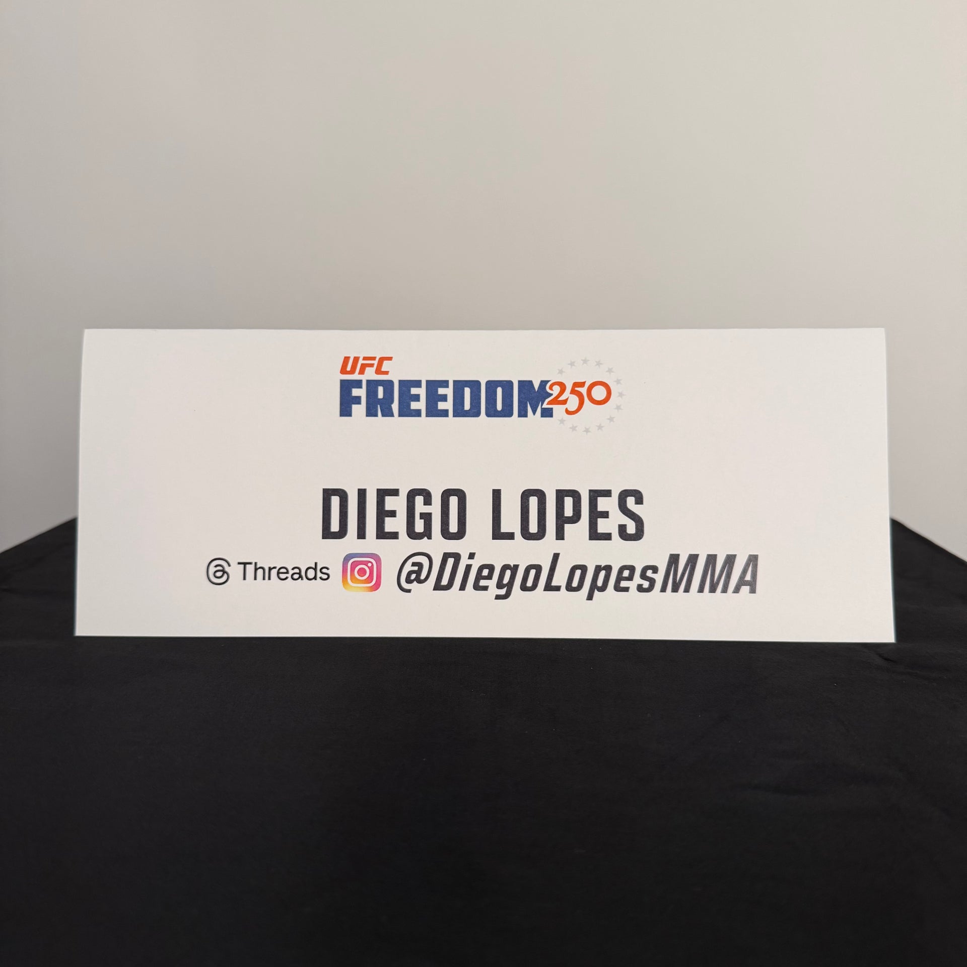 Diego Lopes Press Conference Name Card UFC Freedom 250: Topuria vs Gaethje