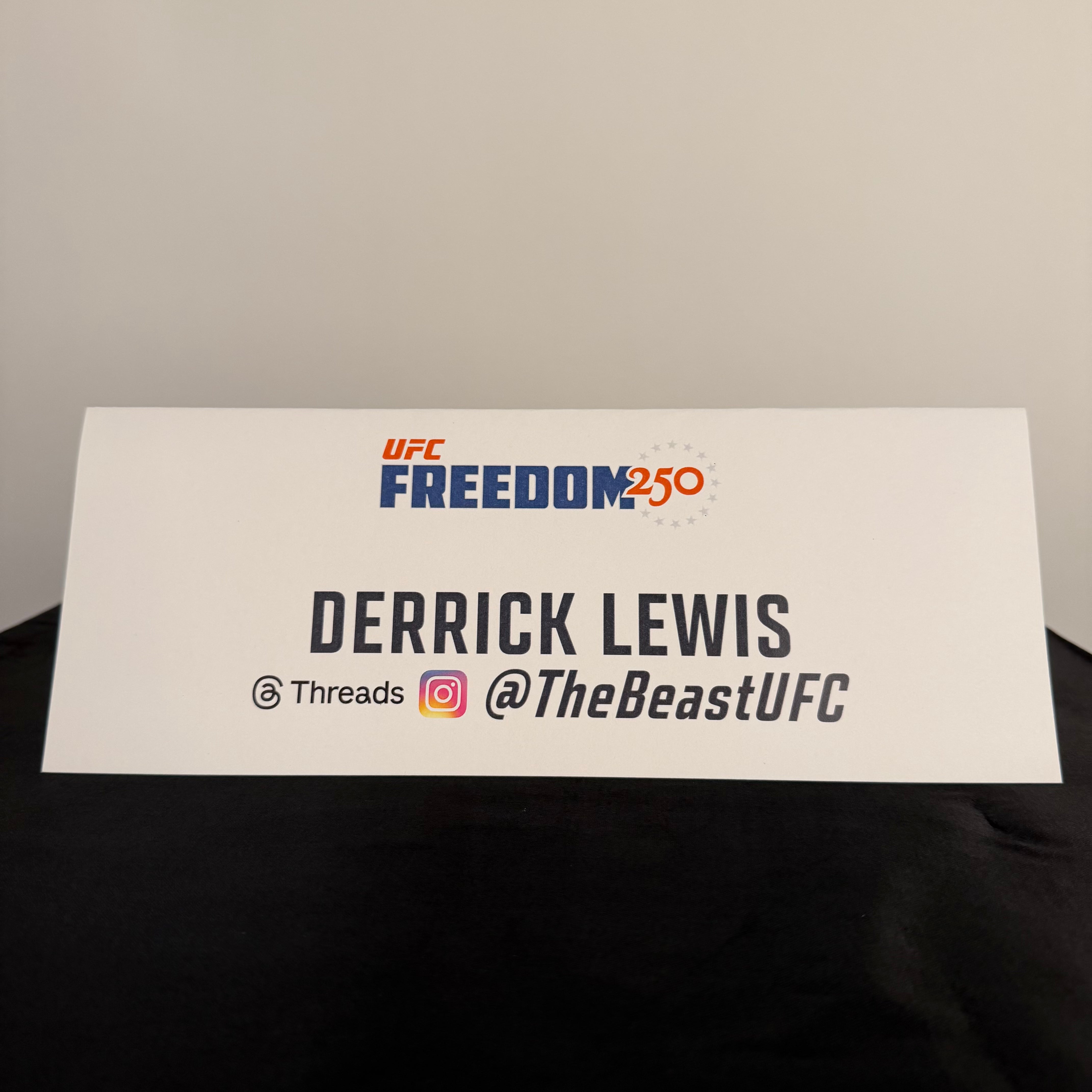 Derrick Lewis Press Conference Name Card UFC Freedom 250: Topuria