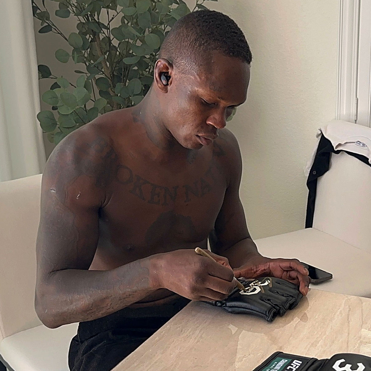 Israel Adesanya Signed Official UFC Gloves - 30th Anniversary Edition